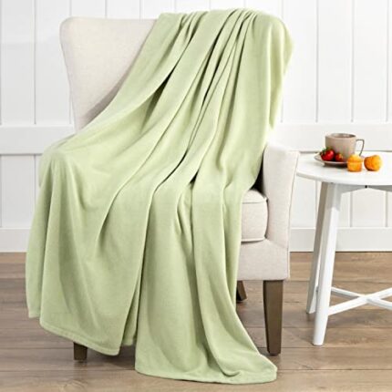 Martex Super Soft Fleece Lightweight Reversible Cozy Warm Sofa Blanket Low Lint Luxury Hotel Style All Seasons Layering Solid Pet Friendly Twin Bed and Couch Blankets, Twin, Green